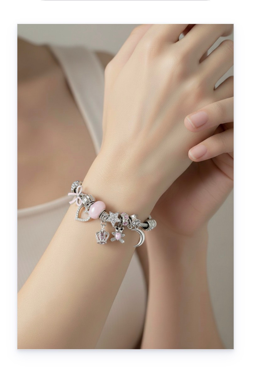 Stainless steel bracelet with dangling charms