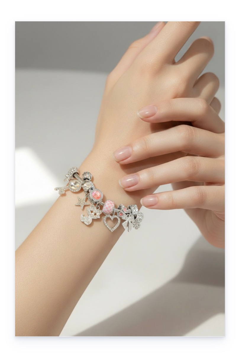 Stainless steel bracelet with dangling charms