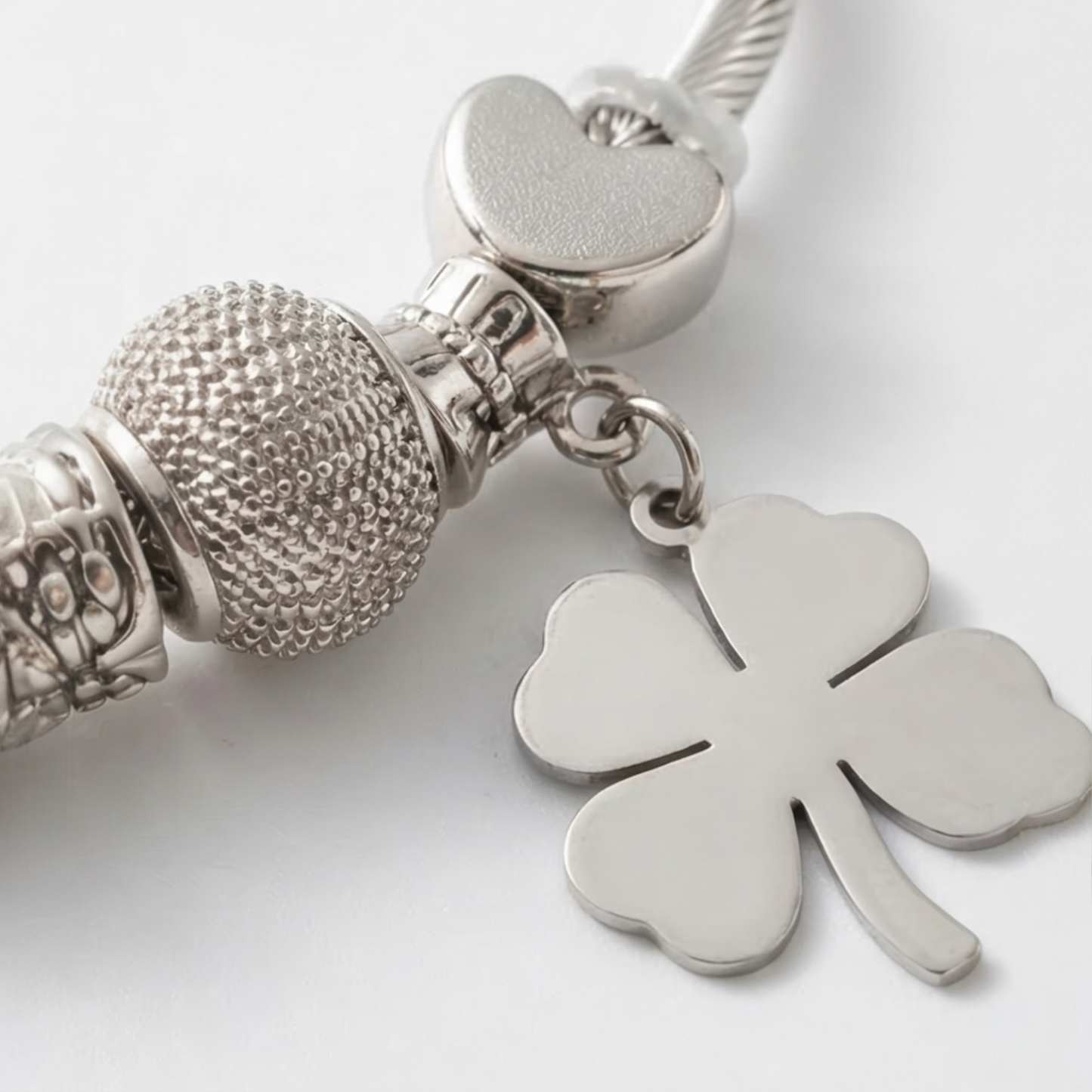 Stainless steel bracelet with dangling charms