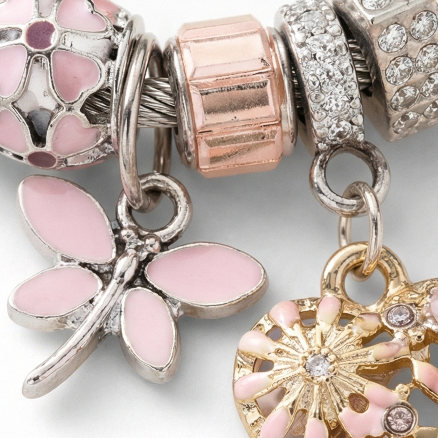 Stainless steel bracelet with dangling charms