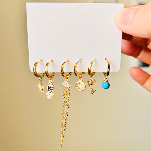 Gold-Plated Small Earrings with Ocean-Inspired Charms.