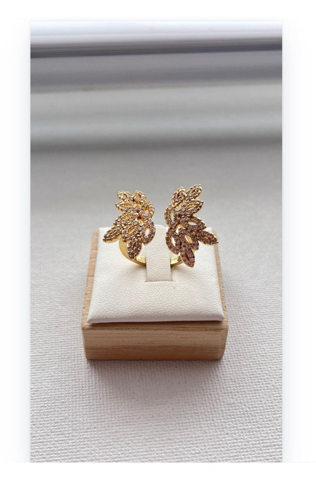 Open Ring with Wing Design and Brilliant Zircon Accents