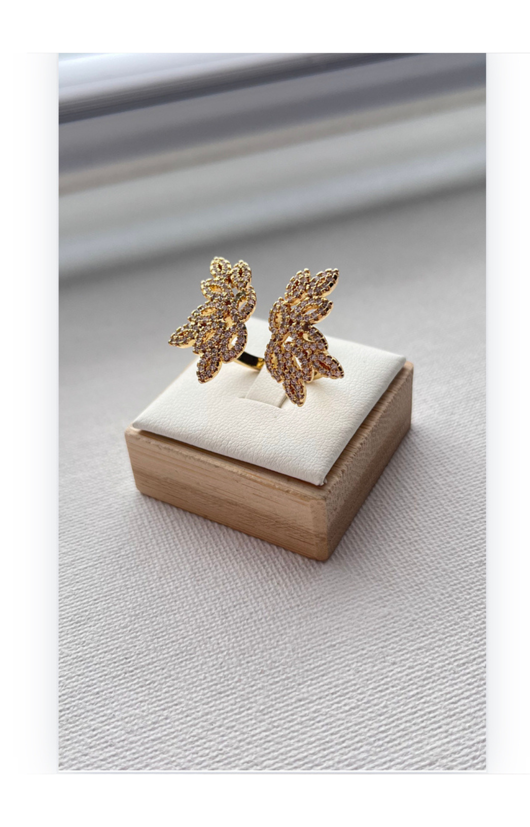 Open Ring with Wing Design and Brilliant Zircon Accents