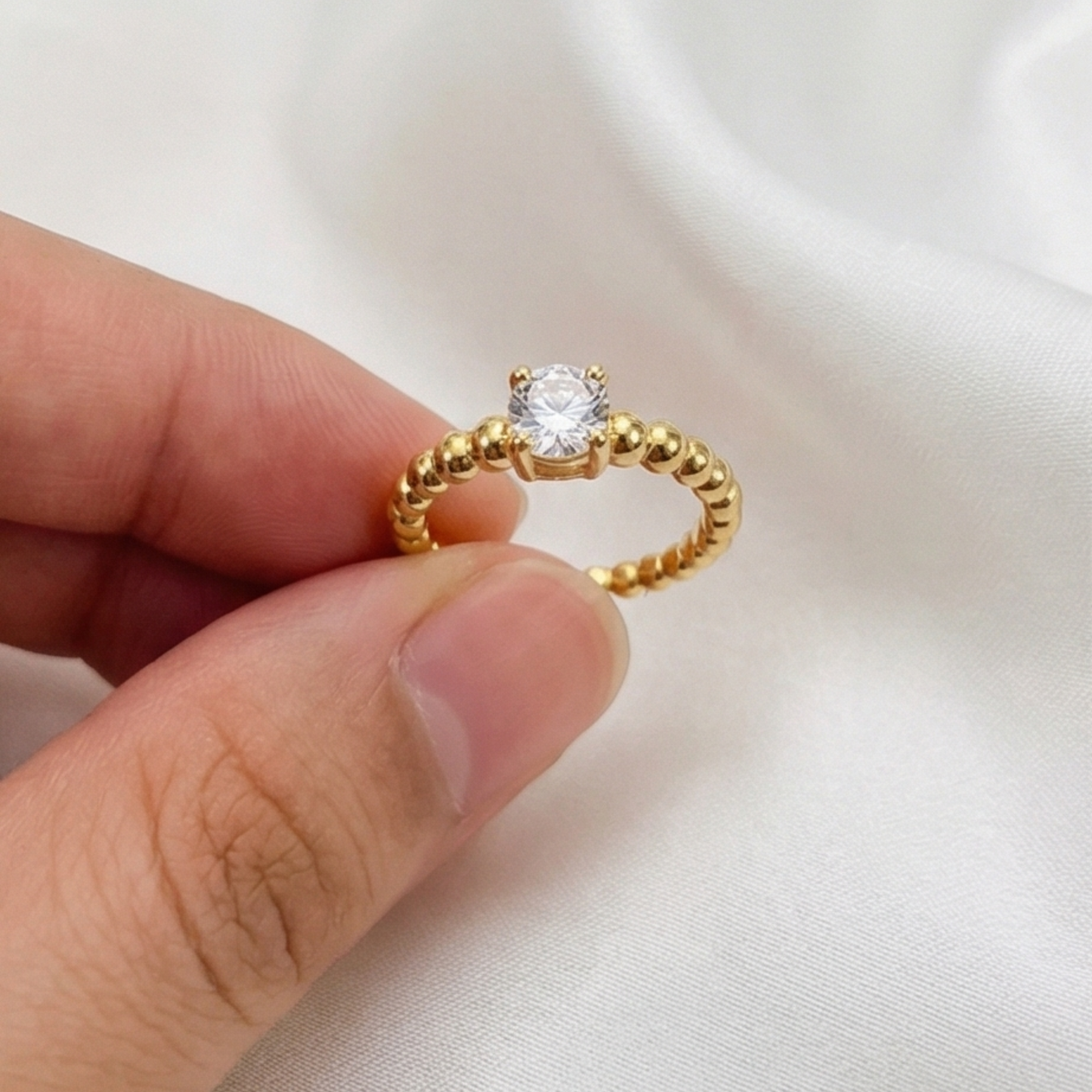 Round-shaped ring, plated in 14k gold, stainless steel