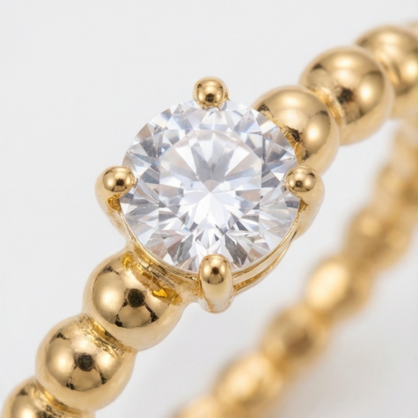 Round-shaped ring, plated in 14k gold, stainless steel