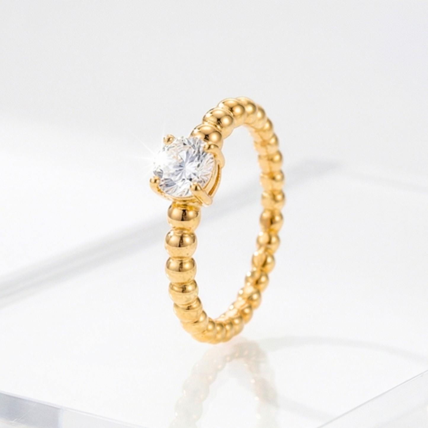 Round-shaped ring, plated in 14k gold, stainless steel