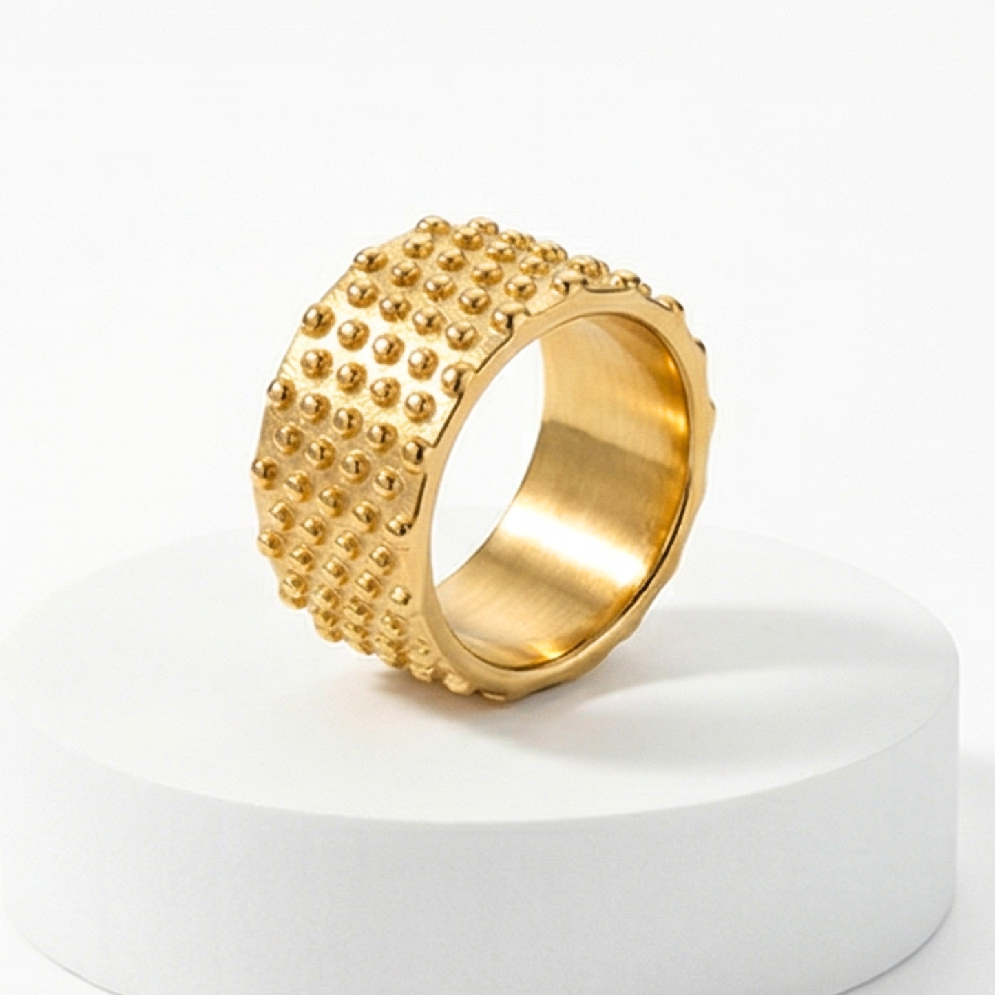 Vintage-style cylindrical ring, made of stainless steel and 18k gold plated