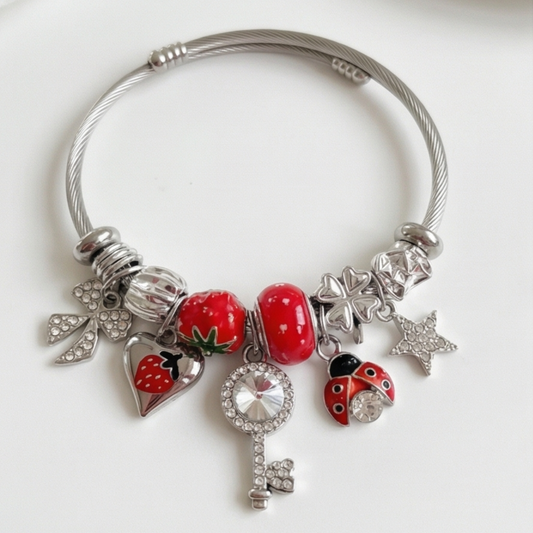 Stainless steel bracelet with dangling charms