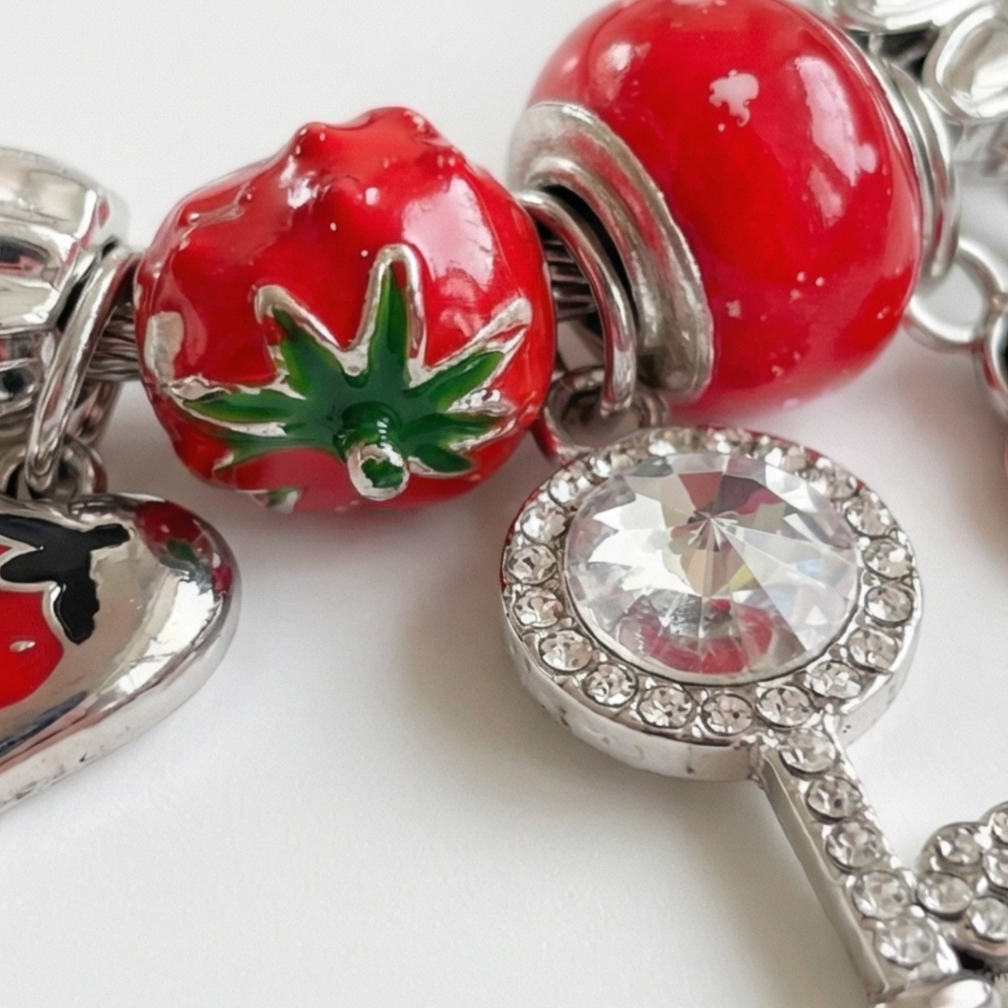 Stainless steel bracelet with dangling charms