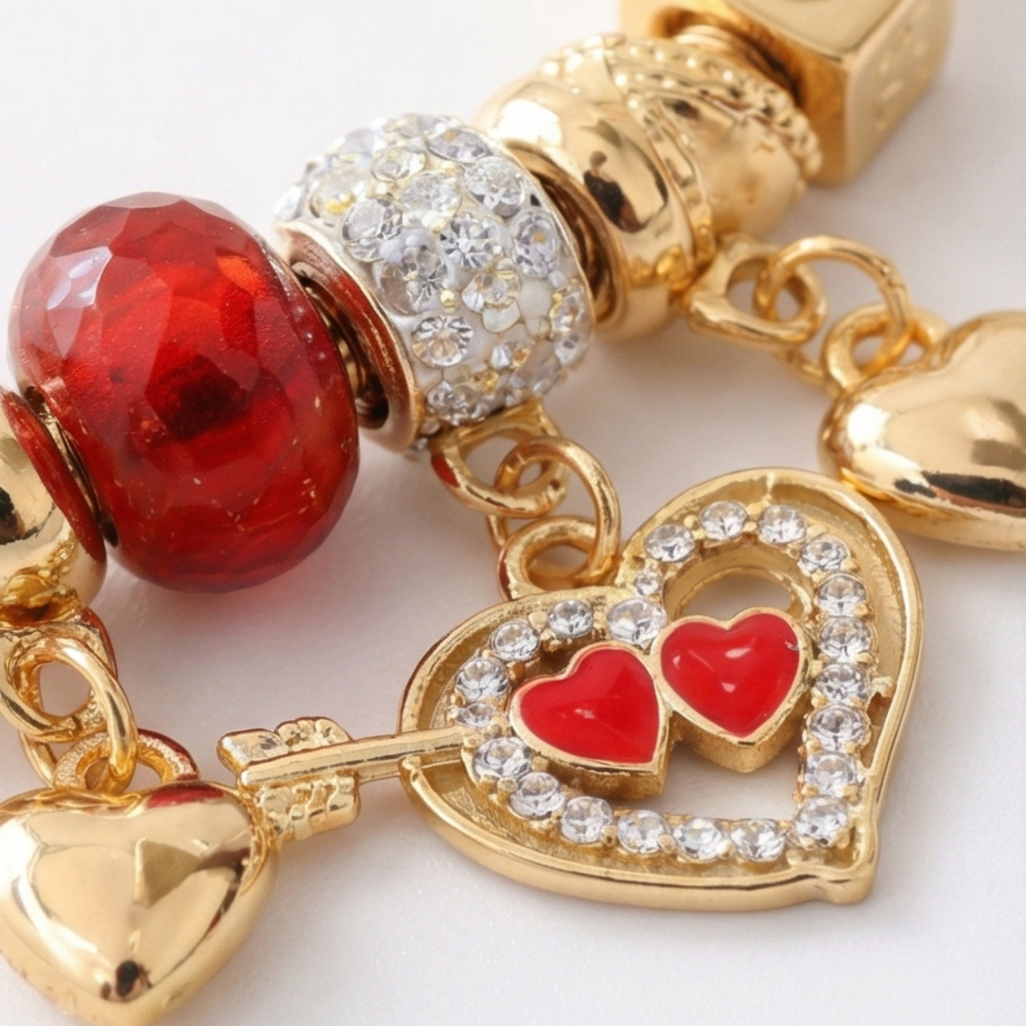 Stainless Steel Bracelet with Dangling Charms and Hearts