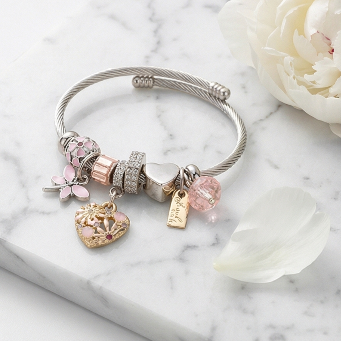 Stainless steel bracelet with dangling charms